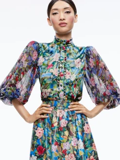 EARLA VEGAN LEATHER FLARE SKIRT + ILAN SMOCKED SLEEVE BUTTON FRONT BLOUSE